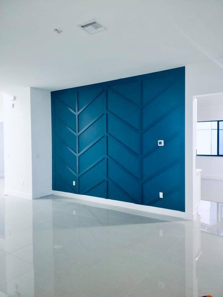 Chevron board-and-batten patterned accent wall