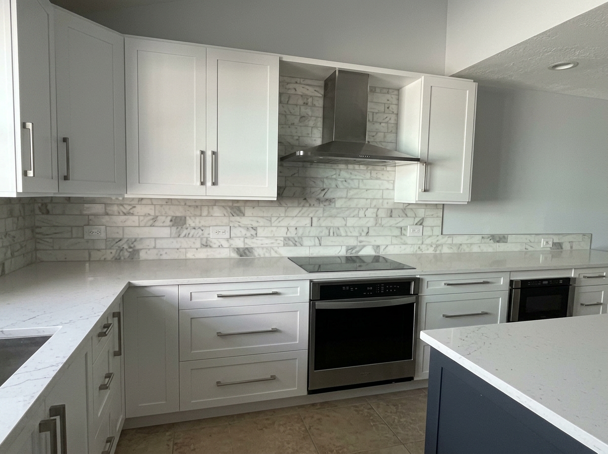 Kitchen remodel with marble subway backsplash and quartz counters